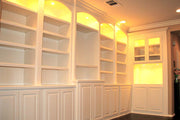 White Paint-Grade Bookcases with Arched Tops and Lights